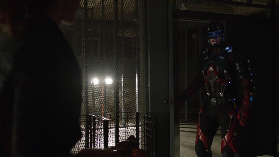 Ray enters the basement room where Zari is standing.