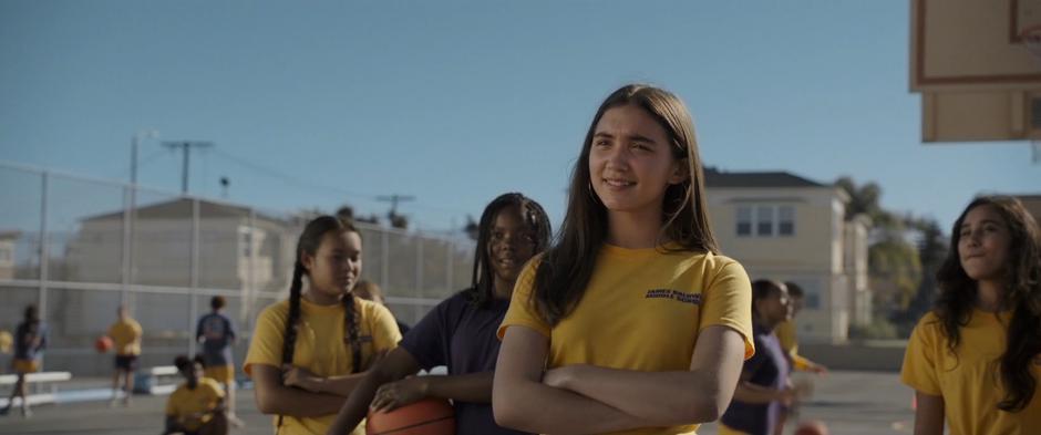 Veronica taunts Meg on the blacktop.