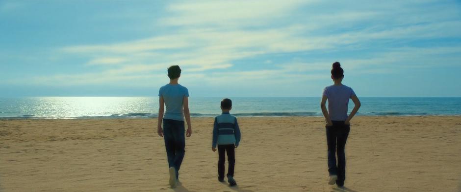 Calvin, Charles Wallace, and Meg keep walking and find themselves on the beach.