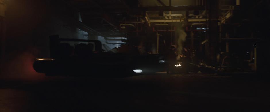 Han & Qi'ra race through the industrial tunnel on the speeder.