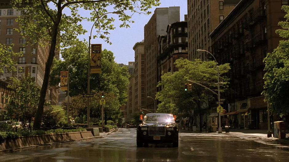 The government car carrying David drives down the empty street to the palace.