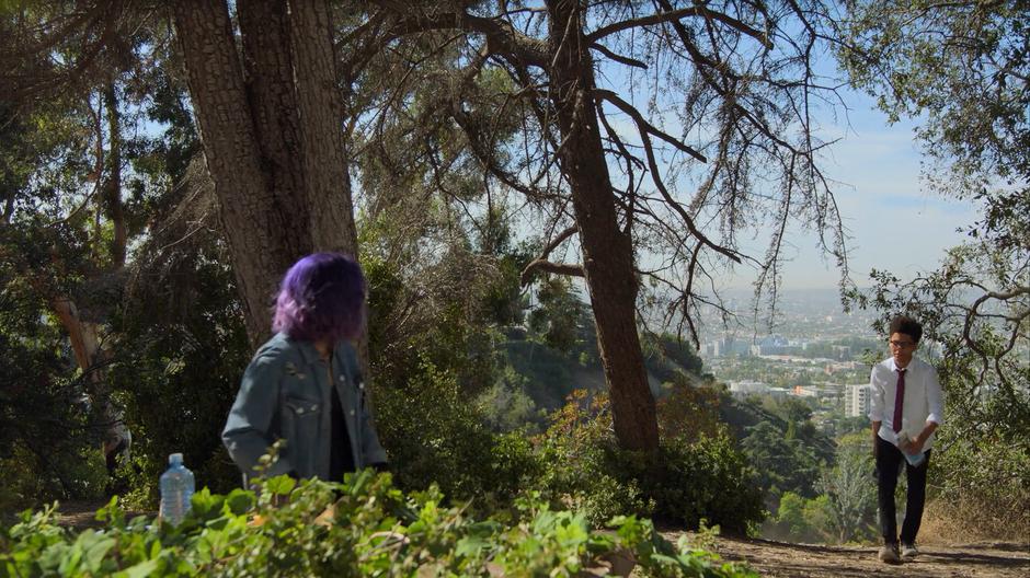 Alex walks back up the hill to where Gert is hanging out.