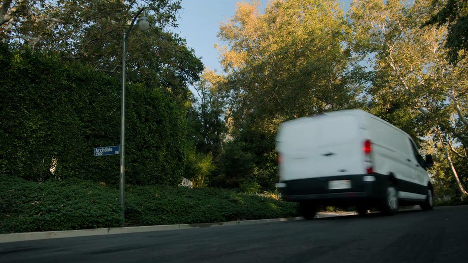 Victor's van continues to drive towards his house.