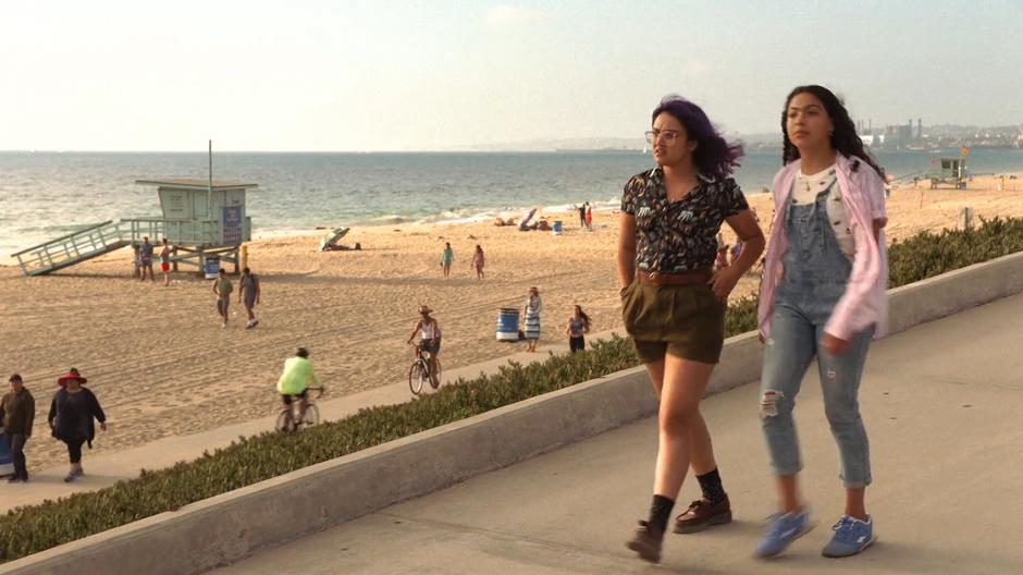 Gert and Molly walk down the ramp leading to the beach.