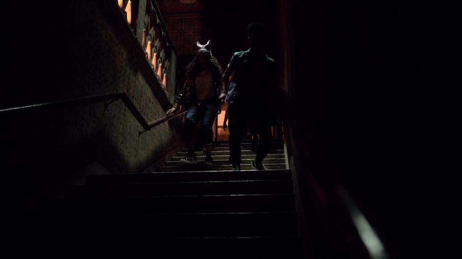 Molly and Alex rush down the stairs with the other kids.