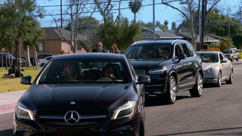 The Yorkes family drives up to the front of the school.