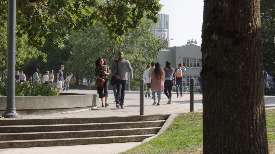 Macy rushes to catch up with Galvin as he walks across campus.