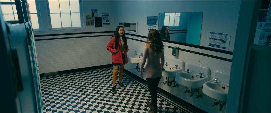 Lara Jean confronts Gen in the bathroom.