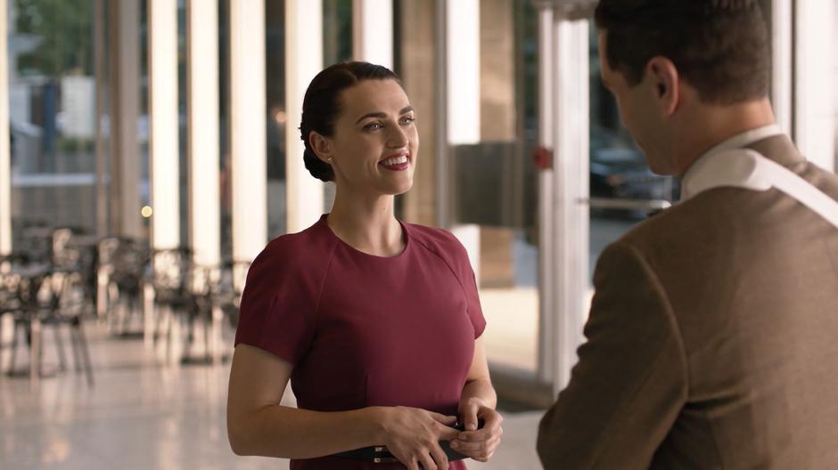 Lena stops to talk with Ben Lockwood about his father's company.