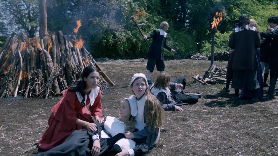 Zari and Prudence Hawthorne kneel over an unconcious Jane and look up at the fairy godmother who is calling for vengeance.