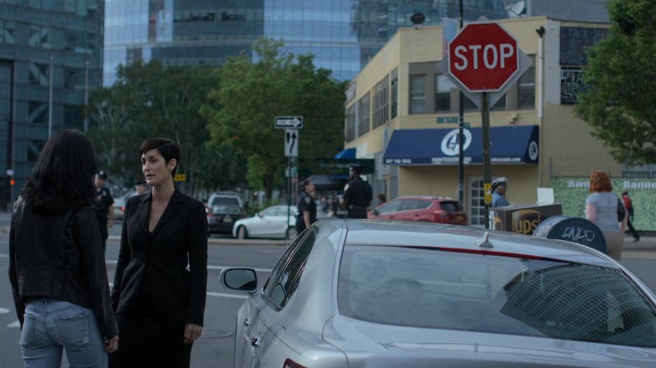 Hogarth stops to talk to Jessica outside standing next to her car.