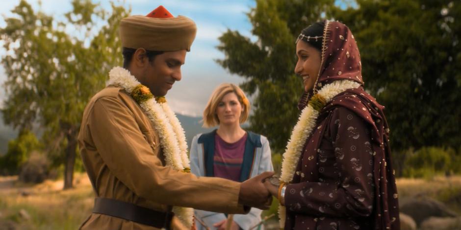 The Doctor presides over the wedding between Prem and Umbreen at the stream.