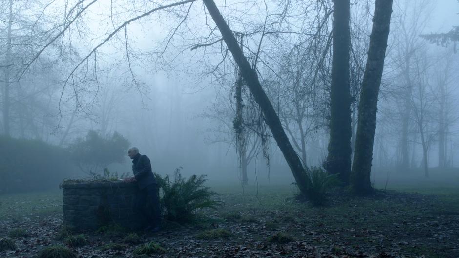 Blaine leans over the well and talks down to his father.