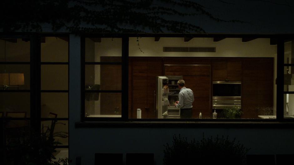 Carson Wolf looks inside his fridge.