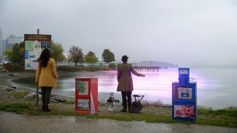 Iris and Sherloque watch as Nora zips around in the bay.