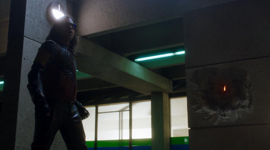 Cisco jumps back as Cicada's dagger slams into the pillar where Barry planted the device.