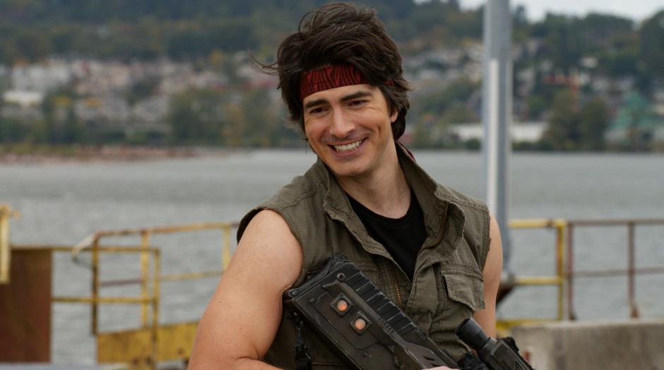 Ray smiles after killing a fugitive while wearing his Rambo outfit.