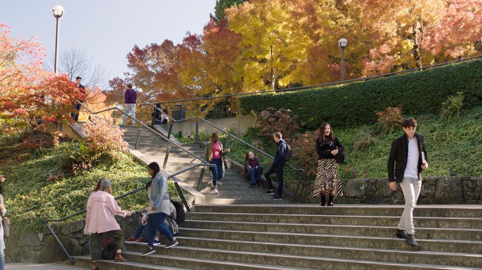 Maggie smiles as Parker walks away after asking her out.