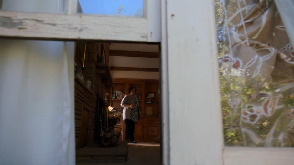 Graciela Aguirre looks around Molly's room and sees the open window.