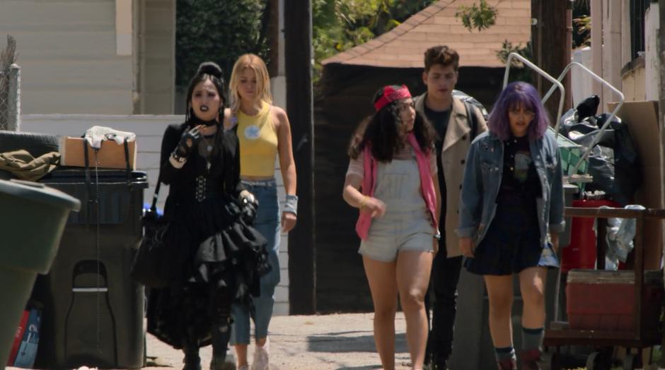 Nico, Karolina, Molly, Chase, and Gert walk down the alley discussing how to get across town.