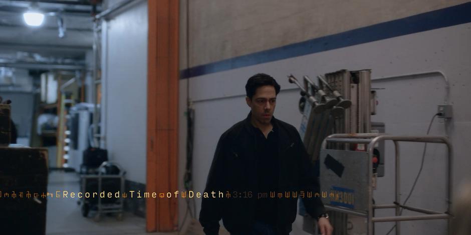 Daniel Sosa walks down the hallway towards the studio.