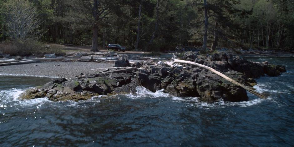 Grant drives his car back on to the beach after visiting the foster home.