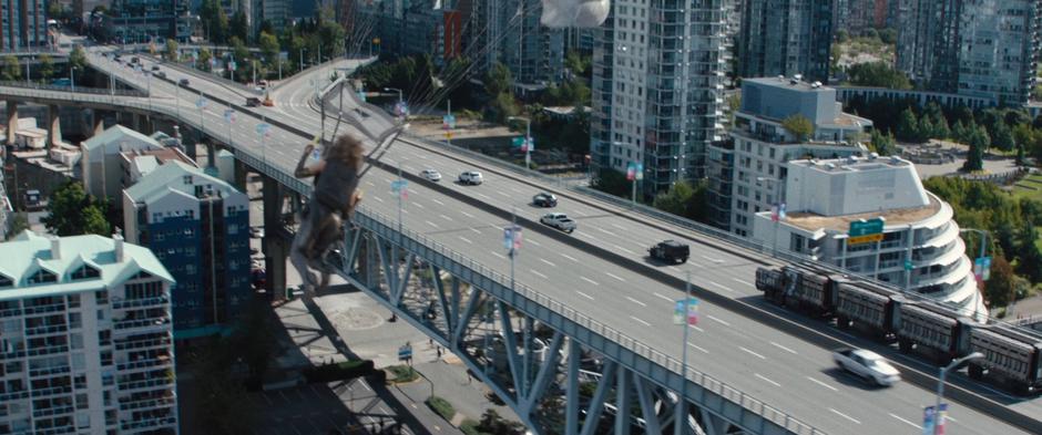 Domino flies down towards the convoy on her parachute.