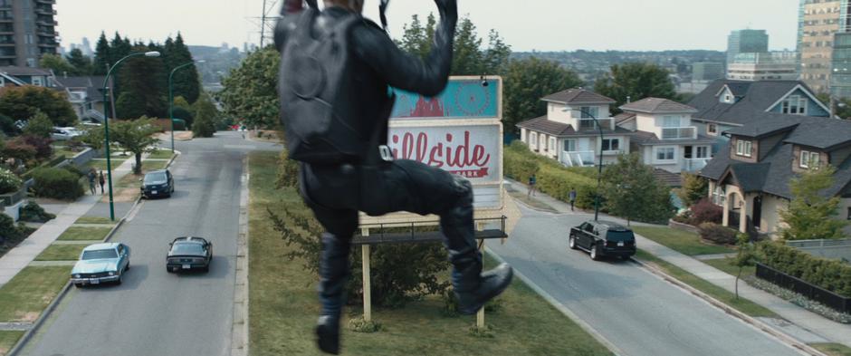 Bedlam tries to control his descent as he approaches the ground on his parachute.