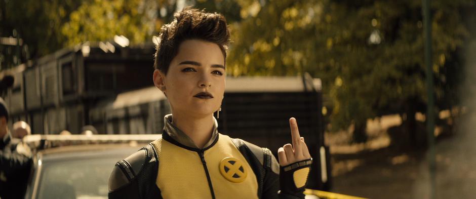 Negasonic Teenage Warhead flicks off Wade.