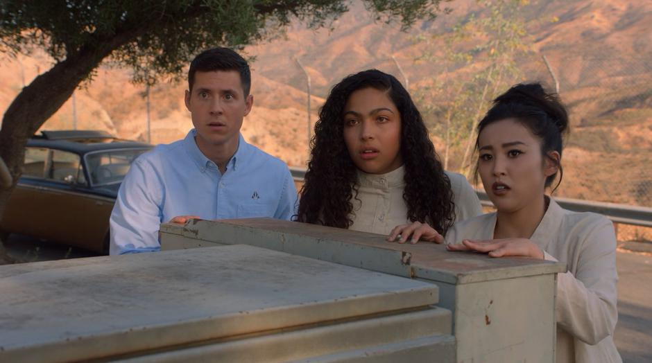 Vaughn, Molly, and Nico watch the compound looking for Karolina.