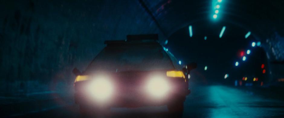 Deckard's car drives into the tunnel.