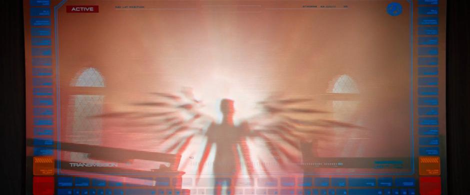 The angelic figure appears from the bright light in the soldier's helmet cam footage.