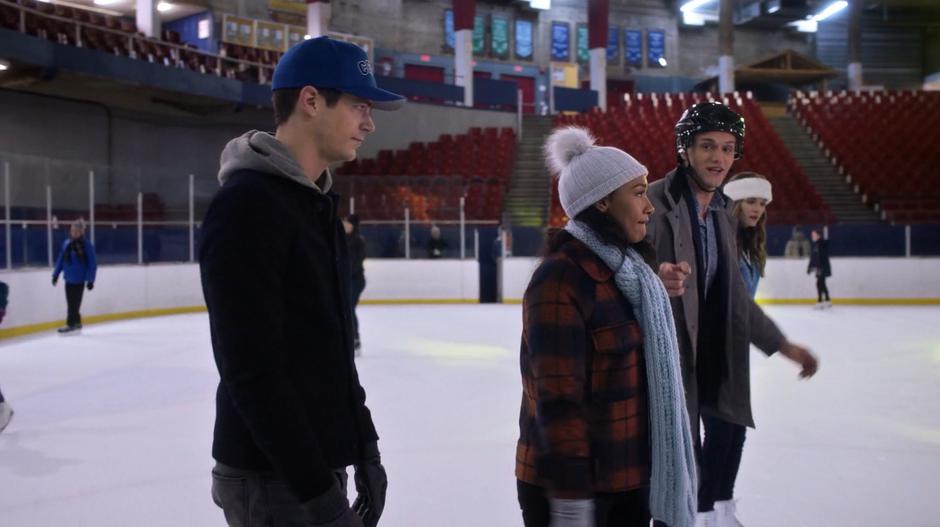 Ralph talks to Iris while they are skating with Barry and Caitlin.