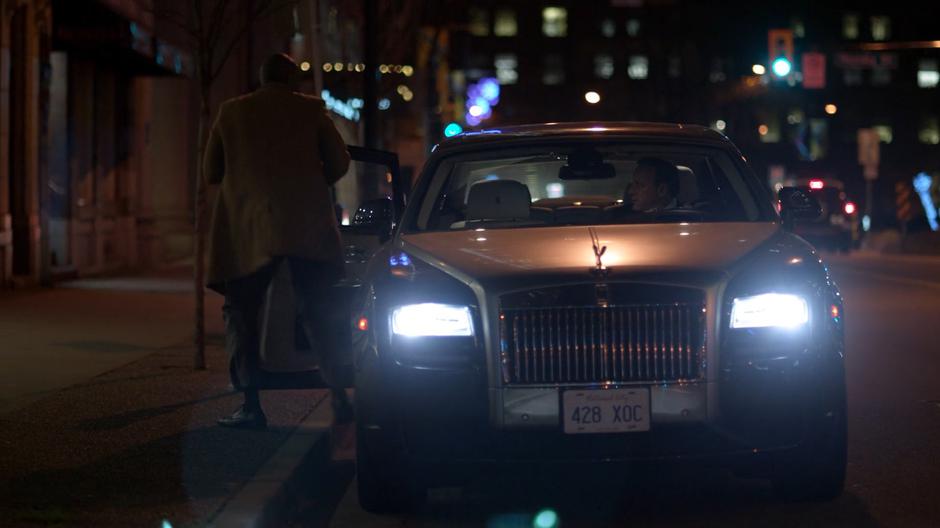 James gets out of Lena's towncar.