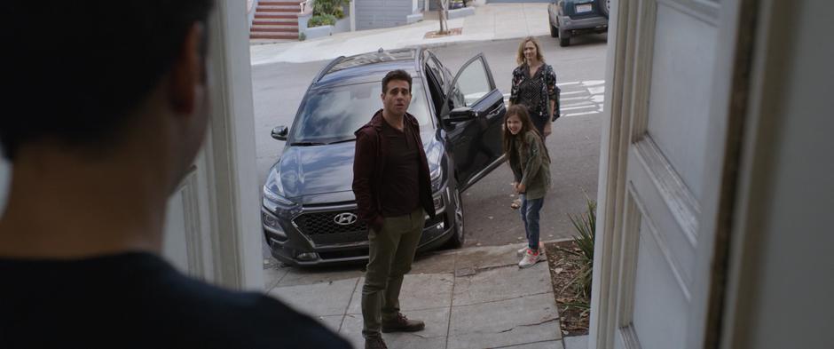 Paxton and Maggie look at Scott while Cassie laughs at his joke.