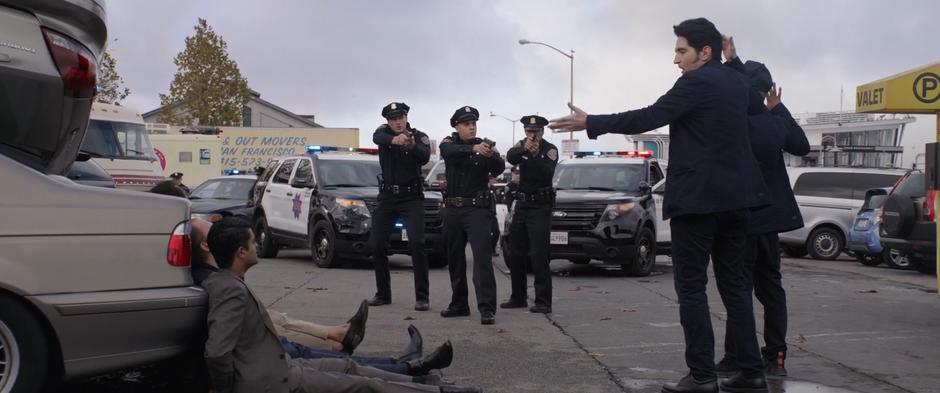 Kurt and Dave explain Sonny Burch and his goons' crimes to several police officers.