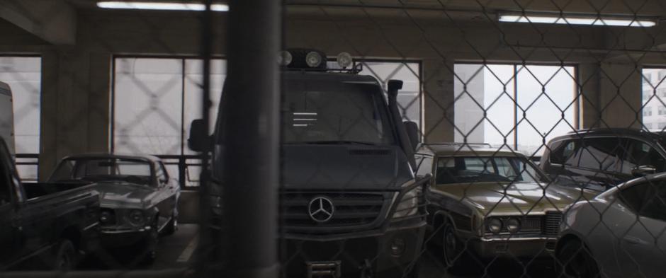 Hank's van sits in the FBI lockup garage.