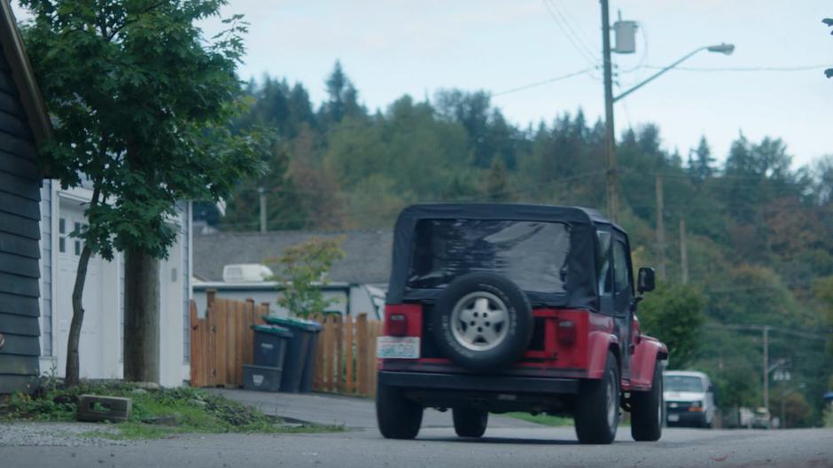 Maddie drives off in her jeep down the alley.