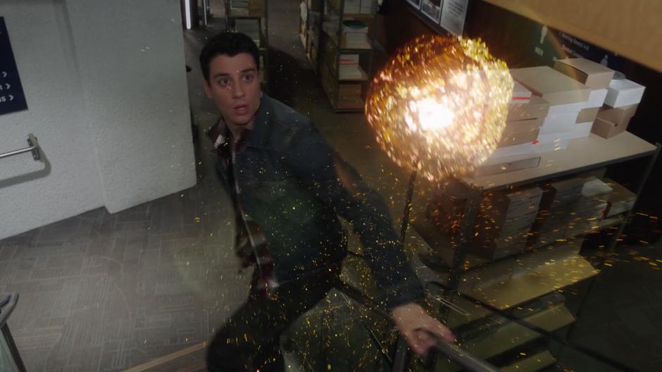 Zack turns around to see Chloe in ball-of-light form while he is trying to escape up the stairs.