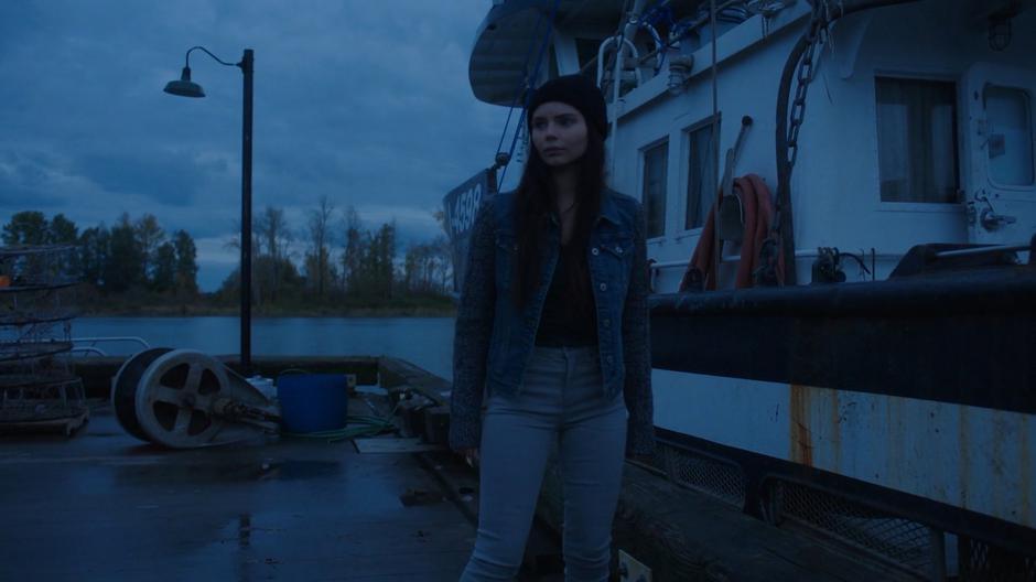 Ryn stands on the dock watching the rest of the pack arrive.