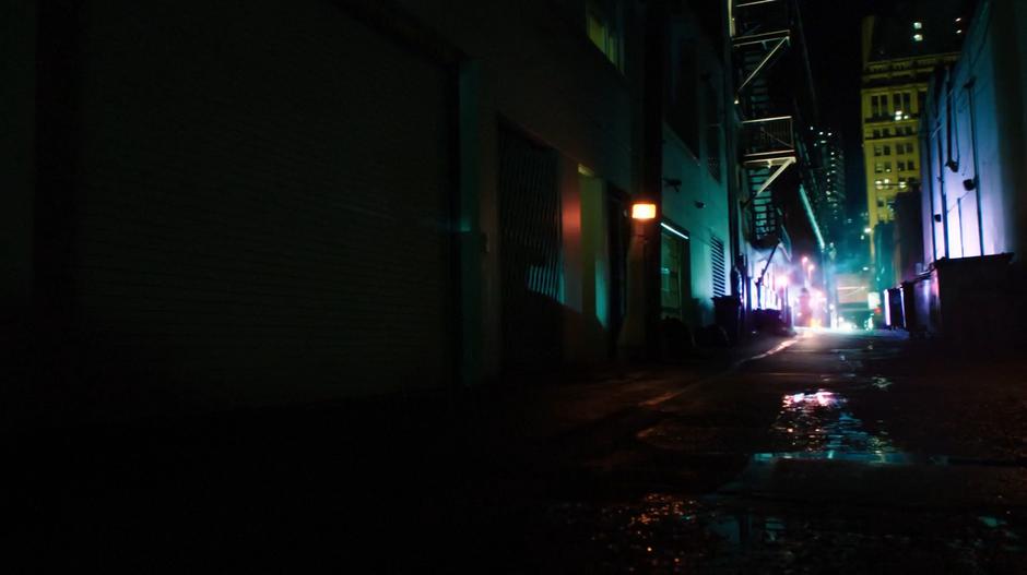 Nora races down the alley with Vickie Bolen in tow.