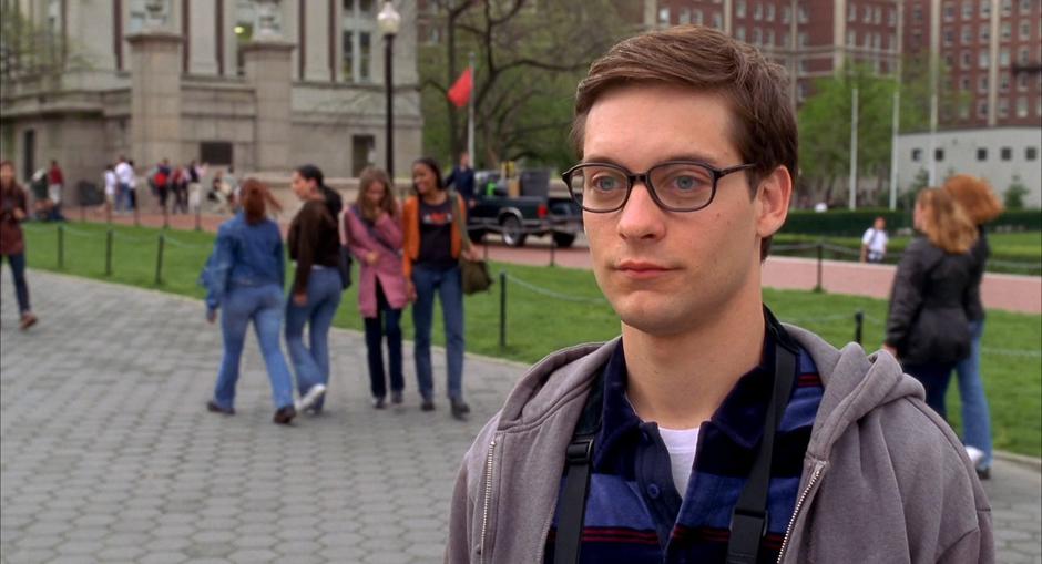 Peter looks at Mary Jane and thinks she is smiling at him.