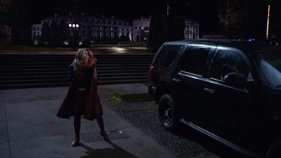 Kara lands next to the suspicious SUV.