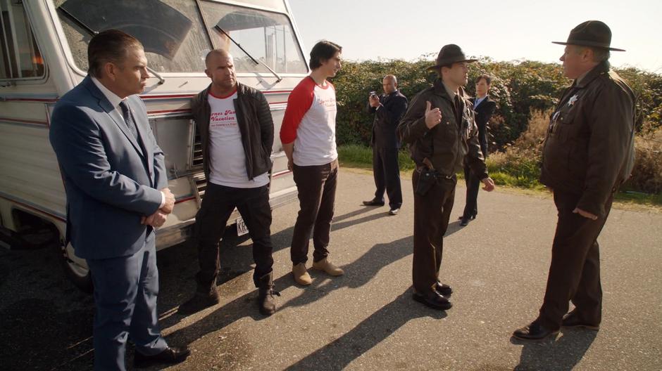 Nate steps in front of his father to defend Mick and Ray while Nixon stands by confused.