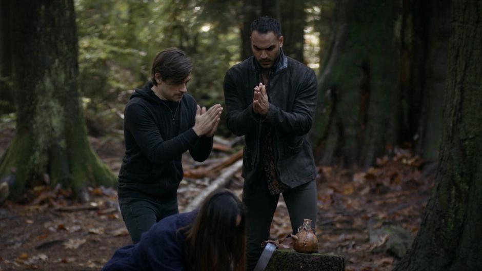 Quentin and Penny cast the spell to trap the monster while Margo kneels over an injured Eliot.