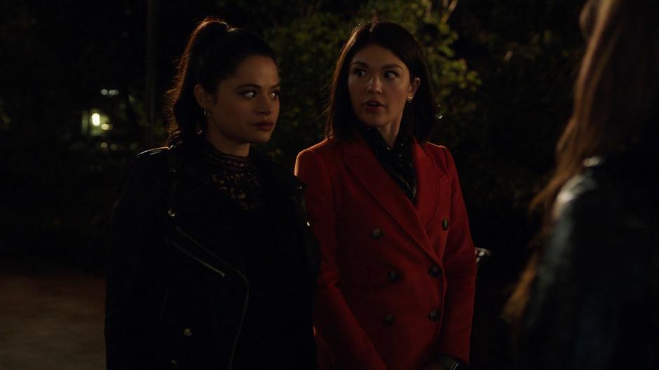 Niko looks at Mel when she realizes Maggie is also a witch.