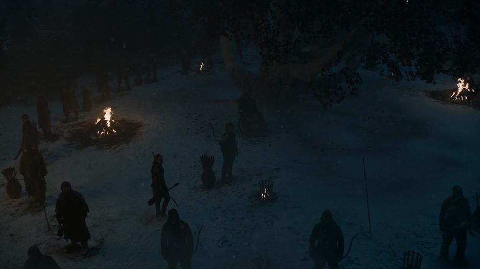 Theon and his archers circle around Bran and the weirwood tree.