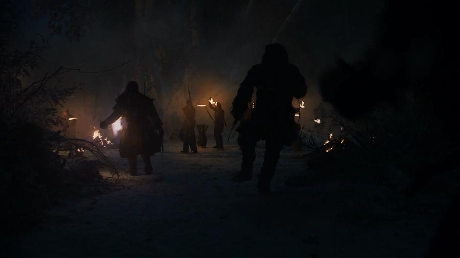 Theon and his archers fire on the wights that race into the grove.