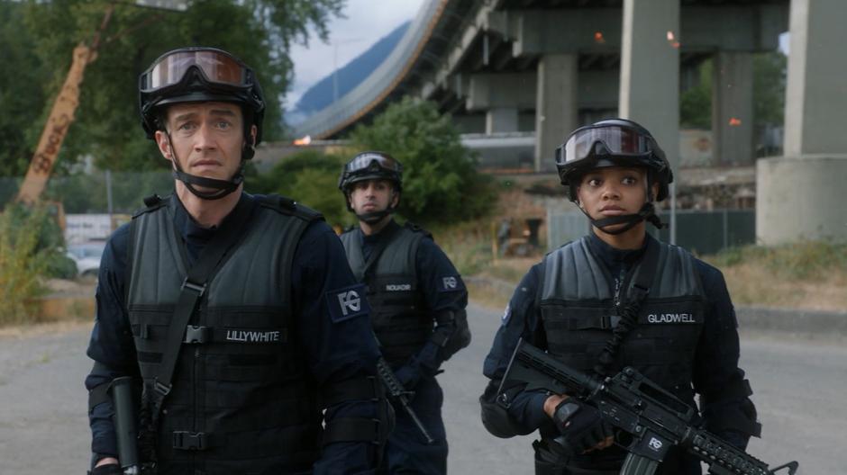 Major, Jordan, and the other guards watch as the bomb explodes at the checkpoint.