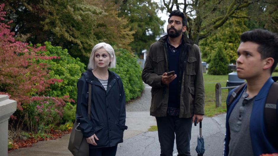 Liv and Ravi look up at Hamm after arriving at the memorial.